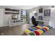 Bedroom view featuring a desk and shelving with colorful accents throughout at 4749 Maple Grove Rd, Martinsville, IN 46151