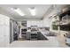 Bright kitchen boasts stainless steel appliances and access to the living room, perfect for entertaining at 4749 Maple Grove Rd, Martinsville, IN 46151