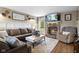 Comfortable living room featuring a brick fireplace and stylish furniture at 4749 Maple Grove Rd, Martinsville, IN 46151