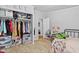 Bedroom featuring a large closet with clothing and a bed with bright linens at 48 W Adams Brick Ave, Martinsville, IN 46151