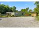 Charming home featuring a well-kept front yard, and a basketball court at 48 W Adams Brick Ave, Martinsville, IN 46151