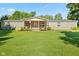 Inviting single-story home with a covered front porch and well-manicured lawn at 48 W Adams Brick Ave, Martinsville, IN 46151