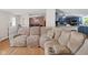 Bright living room featuring a spacious seating area and open flow to the kitchen at 48 W Adams Brick Ave, Martinsville, IN 46151