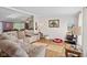 Comfortable living room with plush sectional seating and plenty of natural light at 48 W Adams Brick Ave, Martinsville, IN 46151