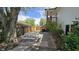 This backyard patio features a large tree, a picnic table and a wood fence for privacy at 492 Pelenor Dr, Franklin, IN 46131