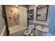 Cozy bathroom with a bathtub, Winnie-the-Pooh shower curtain, and a white vanity at 492 Pelenor Dr, Franklin, IN 46131