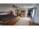 Well-lit bedroom with carpet and a large built-in wooden unit, offering substantial storage at 492 Pelenor Dr, Franklin, IN 46131