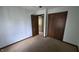 Bedroom view with connecting door to the hallway and double closet at 492 Pelenor Dr, Franklin, IN 46131