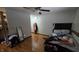 Cozy bedroom with hardwood floors, ceiling fan, and closet at 492 Pelenor Dr, Franklin, IN 46131