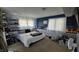 Relaxing bedroom features lots of natural light, carpet, and calming color scheme at 492 Pelenor Dr, Franklin, IN 46131