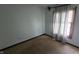 Bedroom with an outdated window, window treatments and worn carpet at 492 Pelenor Dr, Franklin, IN 46131