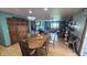 Elegant dining room with hardwood floors seamlessly connects to the living area at 492 Pelenor Dr, Franklin, IN 46131