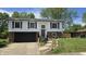 Well maintained front exterior of the home with a new garage door, front door and landscaping at 492 Pelenor Dr, Franklin, IN 46131