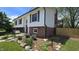 Beautifully landscaped yard and garden beds compliment the front exterior of this home at 492 Pelenor Dr, Franklin, IN 46131