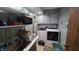 This laundry room features updated machines, a utility sink, and ample storage at 492 Pelenor Dr, Franklin, IN 46131