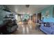 Expansive open living space with hardwood floors and direct access to the dining area at 492 Pelenor Dr, Franklin, IN 46131