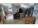 Expansive walk-in closet with shelving, hanging rods, and carpeted floors at 492 Pelenor Dr, Franklin, IN 46131