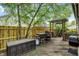 Back deck with a grill, Blackstone griddle, and outdoor storage container at 497 Pebble Way, Greenwood, IN 46142