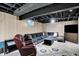 Finished basement featuring a cozy seating arrangement, entertainment area, and a decorative rug at 497 Pebble Way, Greenwood, IN 46142