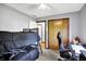 Functional bedroom with a bunk bed, workspace, closet, and easy access to other rooms at 497 Pebble Way, Greenwood, IN 46142