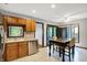 This kitchen features stainless appliances, light counters and dark accents at 497 Pebble Way, Greenwood, IN 46142
