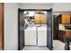 Convenient laundry room with side-by-side washer and dryer at 497 Pebble Way, Greenwood, IN 46142