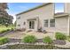 Backyard patio featuring a seating area, grill, and access to the home's sliding glass doors at 523 Torrey Ct, Avon, IN 46123