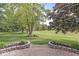 Spacious backyard featuring a brick patio and green lawn, perfect for outdoor activities and relaxation at 523 Torrey Ct, Avon, IN 46123