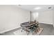 Open basement area with neutral walls, finished floor, and a poker table for recreation and entertainment at 523 Torrey Ct, Avon, IN 46123