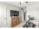 Bedroom with TV on top of a dresser and an exercise bike at 523 Torrey Ct, Avon, IN 46123