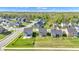Beautiful aerial view of a suburban neighborhood featuring well-maintained lawns and modern two-story homes at 6305 Norwich Dr, Brownsburg, IN 46112