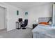 Bedroom featuring neutral walls, carpet, a desk and a window that let in natural light and a view of the neighborhood at 6305 Norwich Dr, Brownsburg, IN 46112