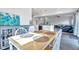 Open-concept dining area seamlessly connects with the kitchen and living room, creating a cohesive living space at 6305 Norwich Dr, Brownsburg, IN 46112