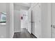 Bright hallway with storage and bathroom access at 6305 Norwich Dr, Brownsburg, IN 46112