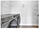 Clean Laundry Room featuring side by side washer and dryer and ample wire shelving and luxury vinyl flooring at 6305 Norwich Dr, Brownsburg, IN 46112