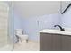 Bathroom featuring shower, toilet and vanity with modern fixtures at 641 E 33Rd St, Indianapolis, IN 46205