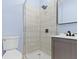 Modern bathroom featuring a glass-door shower and sleek vanity at 641 E 33Rd St, Indianapolis, IN 46205