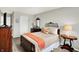 Bedroom with a wooden bed frame, matching furniture, and neutral colors, creating a relaxing atmosphere at 6429 Yuma Ct, Whitestown, IN 46075