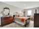 Bedroom with a wooden bed frame, matching furniture, and neutral colors with a comfy vibe at 6429 Yuma Ct, Whitestown, IN 46075