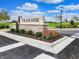Trailside community entrance sign with beautiful landscaping on a sunny day at 6429 Yuma Ct, Whitestown, IN 46075