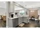 Bright kitchen featuring stainless steel appliances, white subway tiles, and a breakfast bar at 6429 Yuma Ct, Whitestown, IN 46075