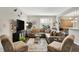 Comfortable living room with a plush sectional sofa, stylish decor, and a large window at 6429 Yuma Ct, Whitestown, IN 46075