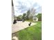 Full backyard view with patio, hot tub and shed at 6550 Spring Flower Dr, Indianapolis, IN 46237