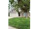 Charming two-story home with brick accents, a well-manicured lawn, and an attached two-car garage at 6550 Spring Flower Dr, Indianapolis, IN 46237