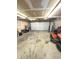 Spacious and well lit garage with plenty of room for vehicles, storage, and projects at 6550 Spring Flower Dr, Indianapolis, IN 46237