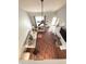 Open-concept living room featuring wood floors, neutral walls, and a ceiling fan at 6550 Spring Flower Dr, Indianapolis, IN 46237