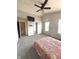 Spacious bedroom with vaulted ceilings, large windows, and ample closet space for comfortable living at 6550 Spring Flower Dr, Indianapolis, IN 46237