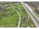 Aerial view showing property adjacent to highway, surrounded by green fields and trees at 6585 N Waverly Park Rd, Martinsville, IN 46151