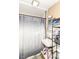 Small bathroom features a white sink, patterned shower curtain, and a storage rack with towels at 6585 N Waverly Park Rd, Martinsville, IN 46151