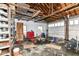 Spacious garage needs clearing, featuring overhead wood beams and a concrete floor at 6585 N Waverly Park Rd, Martinsville, IN 46151